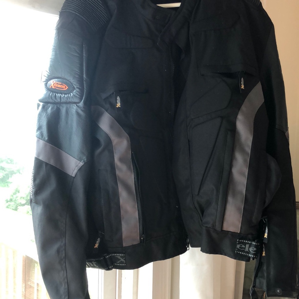 Motorcycle jacket slightly used but looks brand new